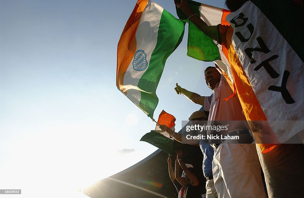 Indian fans celebrate a boundary