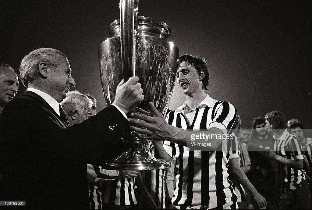 Johan Cruijff (R) recieves the Cup after winning the European Cup final match between Ajax and Juventus at the Red Star Stadium on May 30, 2012 in Belgrade, Yugoslavia.